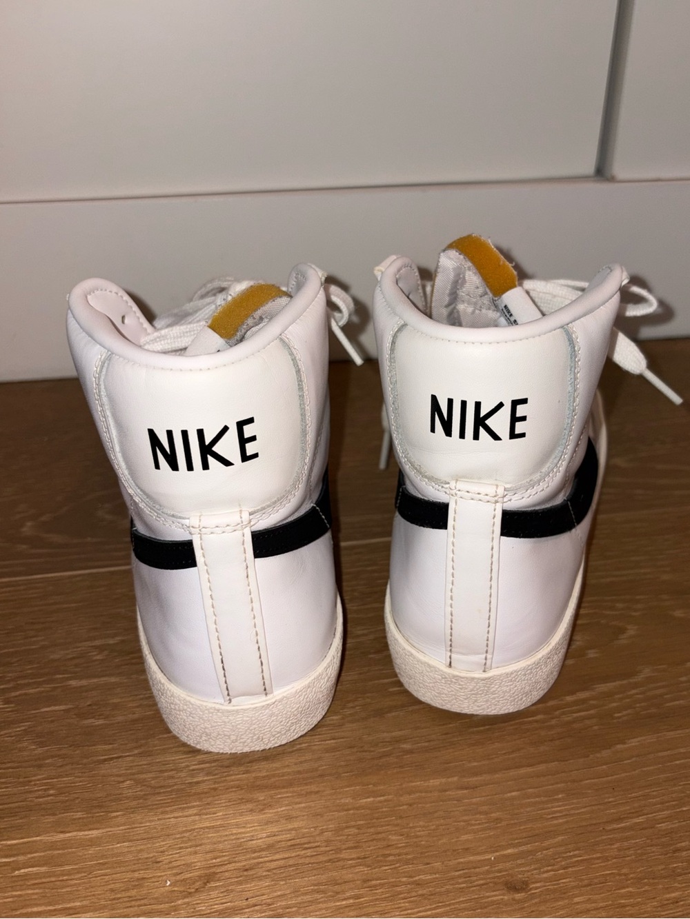 Nike Women's White High-Top Sneakers with Black Accent